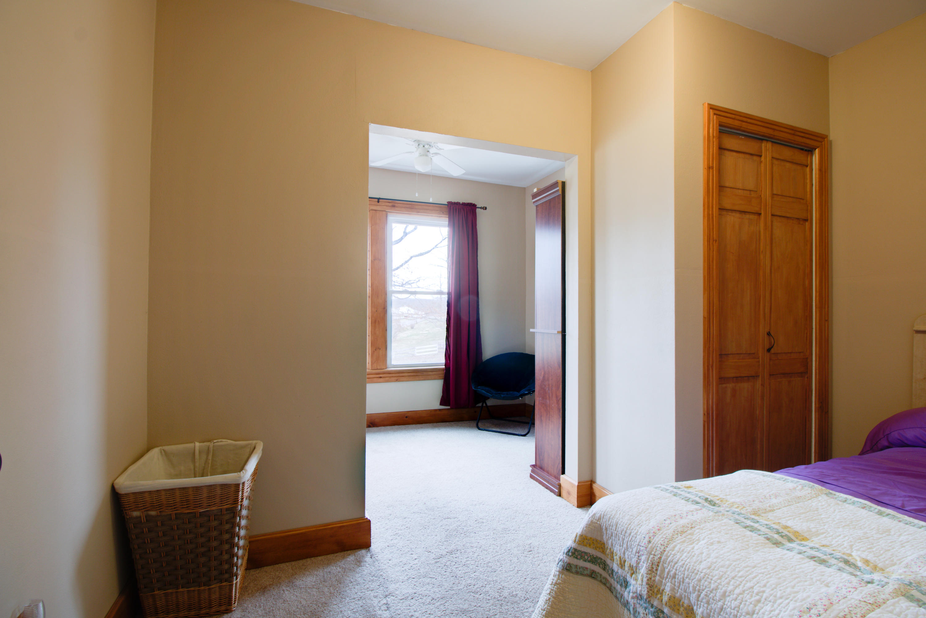 4324 Rakes Road Roanoke, VA 24014 - Photo 18 of 38 a bedroom with a bed and a chair