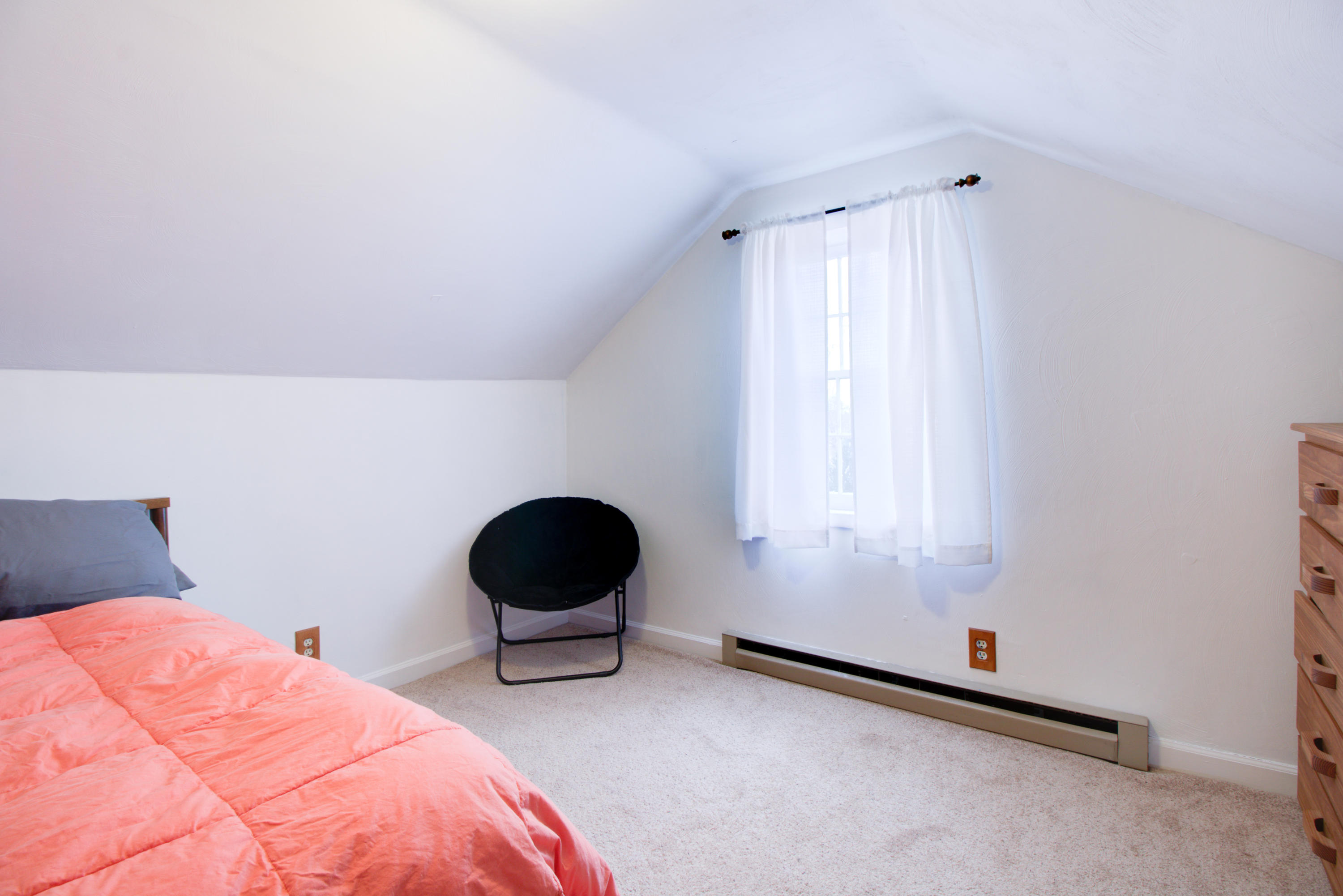 4324 Rakes Road Roanoke, VA 24014 - Photo 22 of 38 a bedroom with a bed and a chair