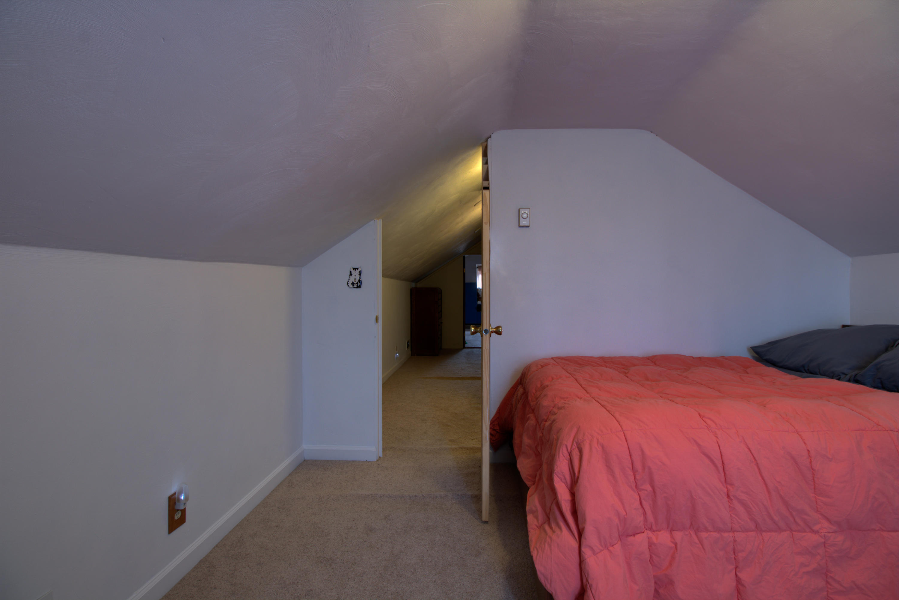 4324 Rakes Road Roanoke, VA 24014 - Photo 23 of 38 a bedroom with a bed and a painting on the wall