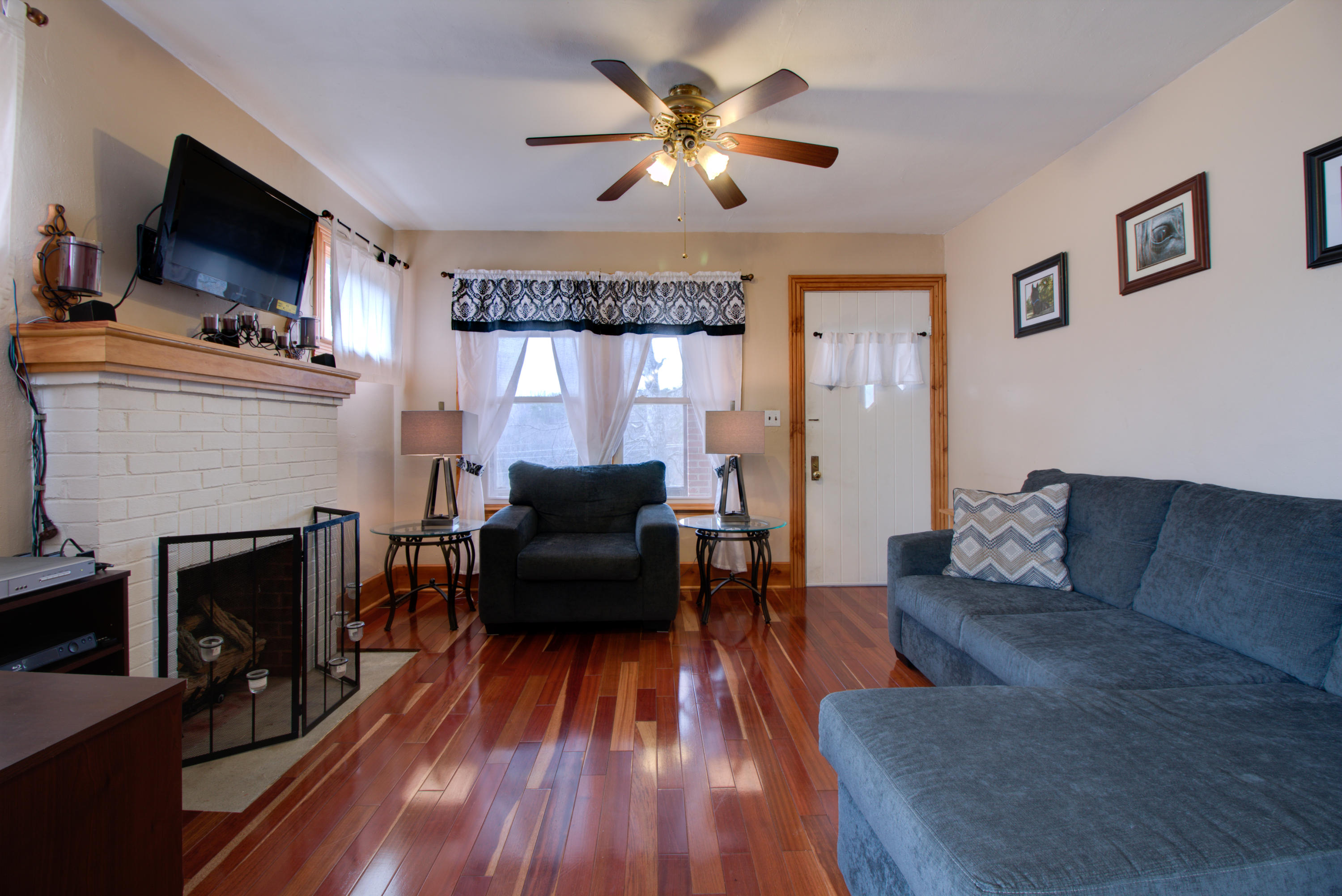 4324 Rakes Road Roanoke, VA 24014 - Photo 8 of 38 a living room with furniture and a fireplace