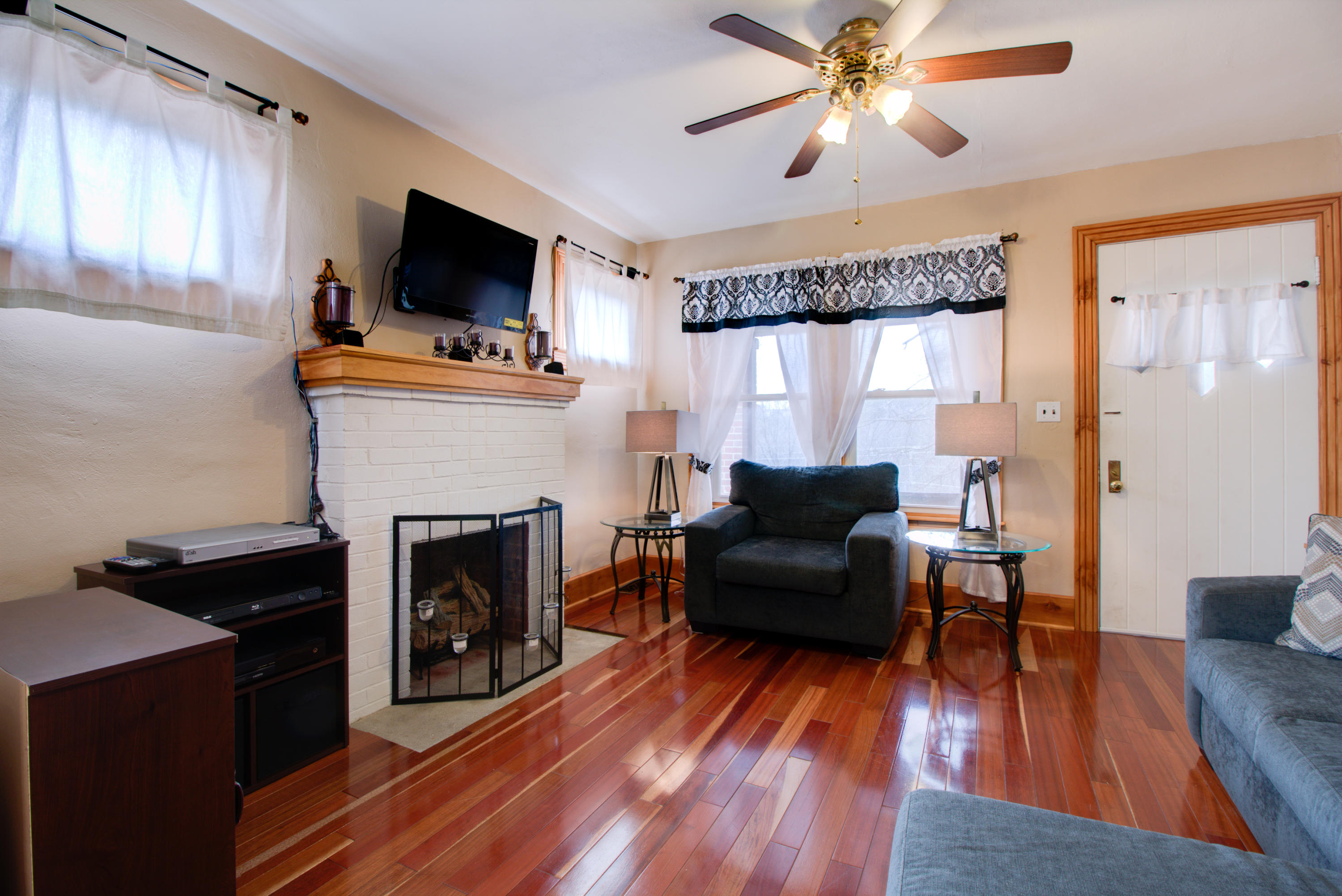 4324 Rakes Road Roanoke, VA 24014 - Photo 9 of 38 a living room with furniture and a fireplace