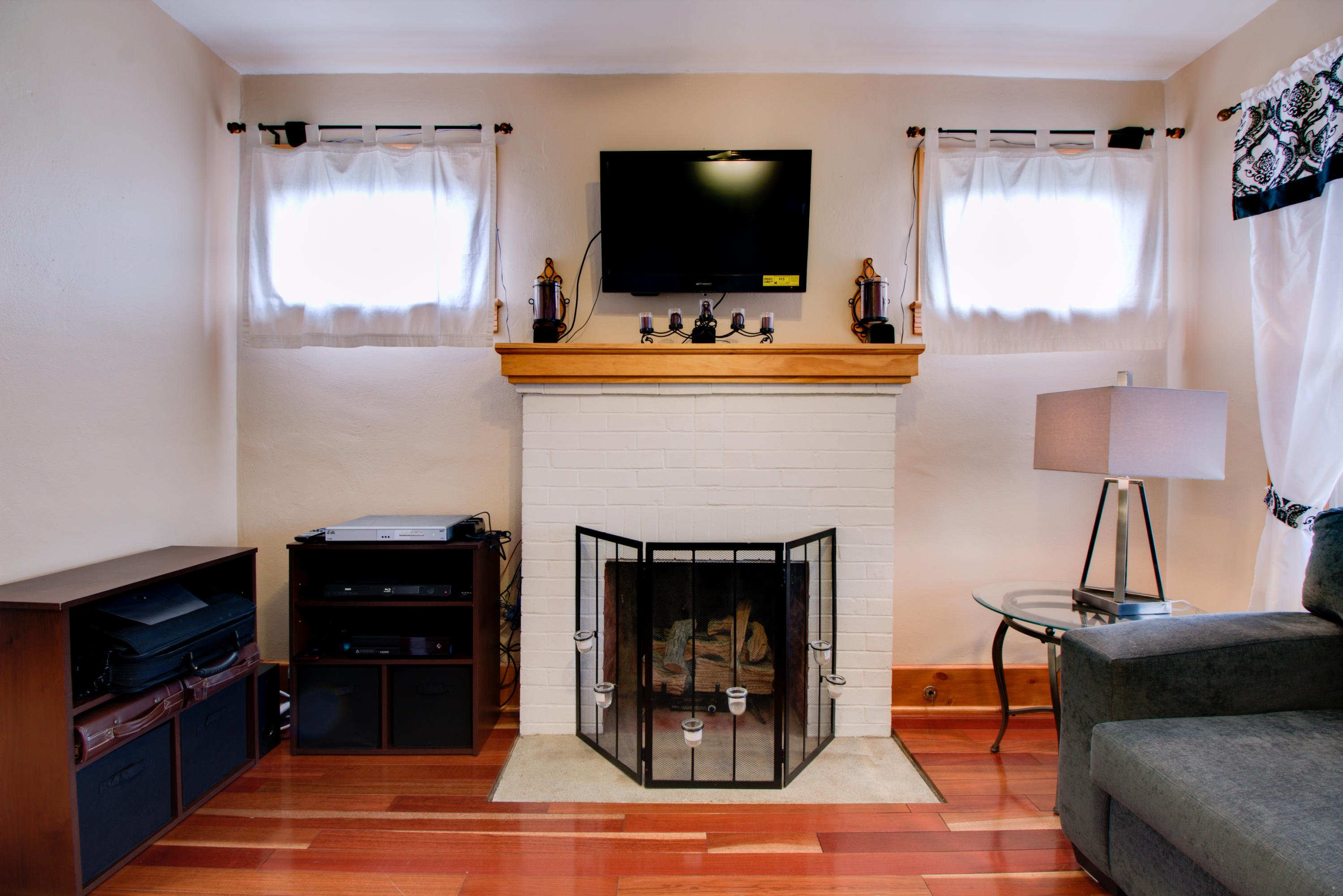 4324 Rakes Road Roanoke, VA 24014 - Photo 10 of 38 a living room with furniture and a flat screen tv
