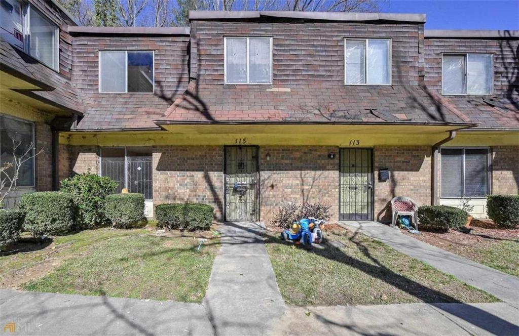 115 Peyton Place Southwest Atlanta, GA 30311 - Photo 1 of 1 a view of a cafe with sitting area and swimming pool