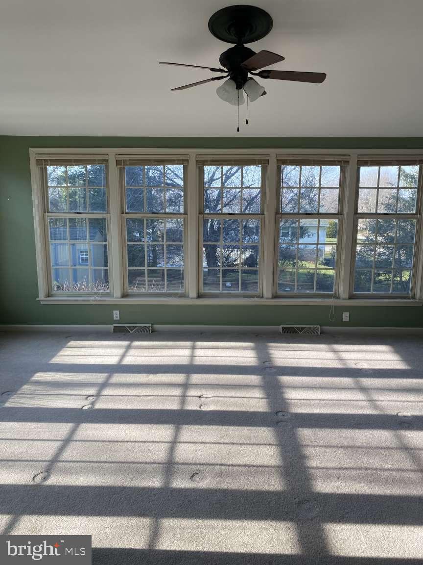 1837 Downing Street York, PA 17408 - Photo 5 of 21 a view of a livingroom with a ceiling fan and window