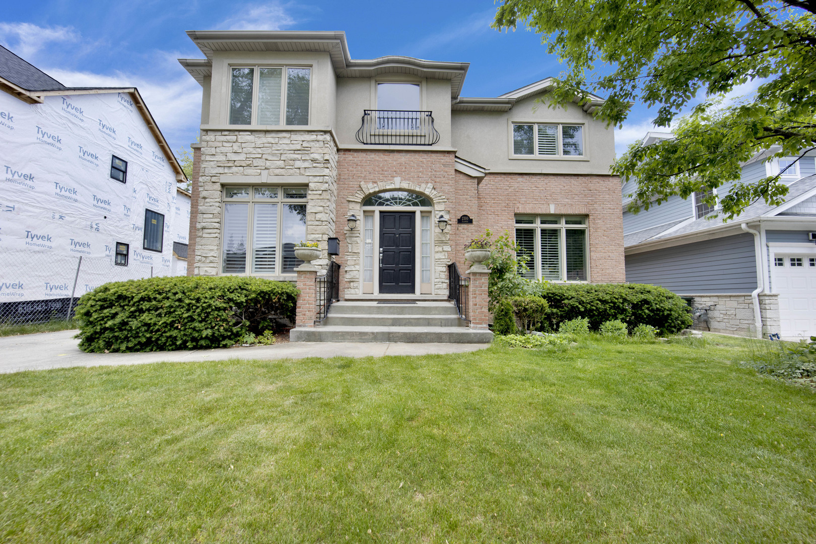 2310 Illinois Road Northbrook, IL 60062 - Photo 1 of 41 front view of a house with a yard