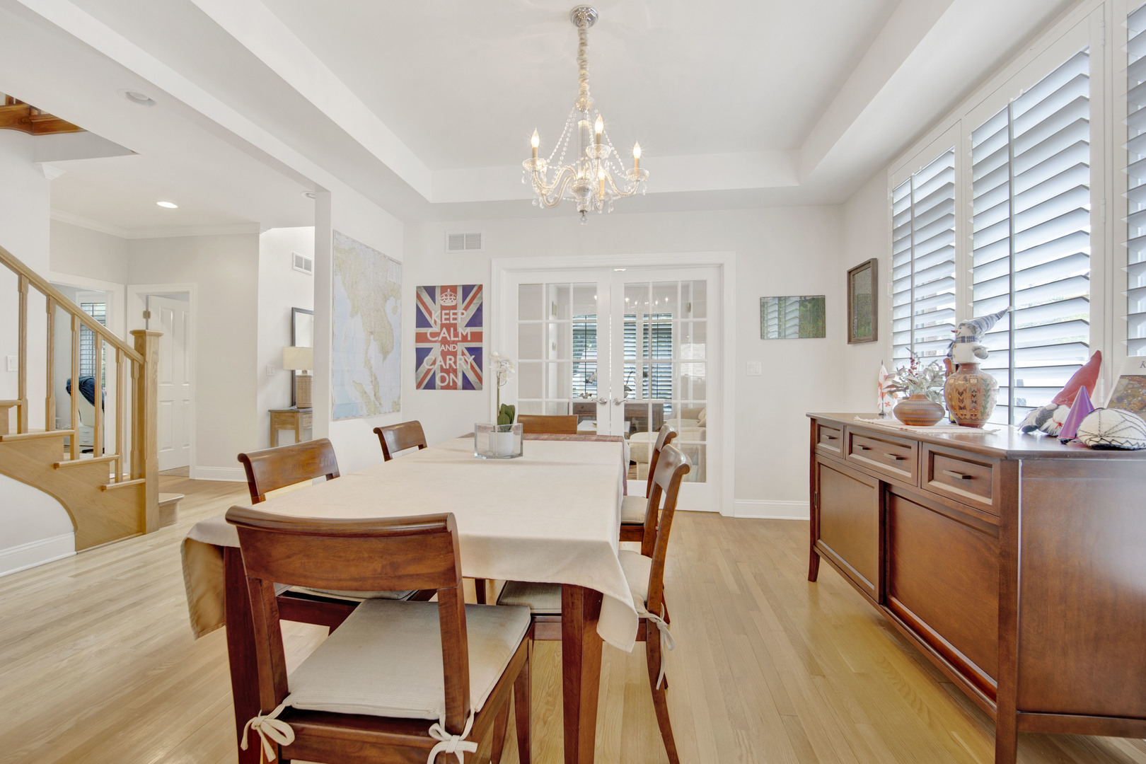 2310 Illinois Road Northbrook, IL 60062 - Photo 8 of 41 a view of a dining room with furniture window and wooden floor