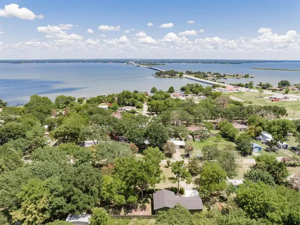 an aerial view of a houses with outdoor space