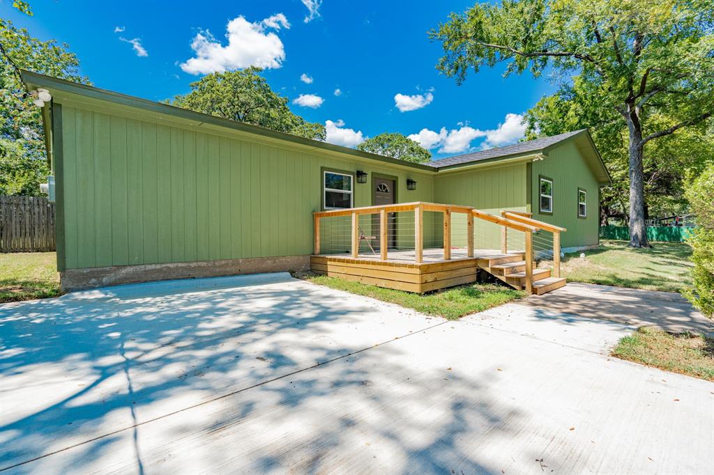304 Pine Street Seven Points, TX 75143 - Photo 32 of 38 a house view with a backyard space