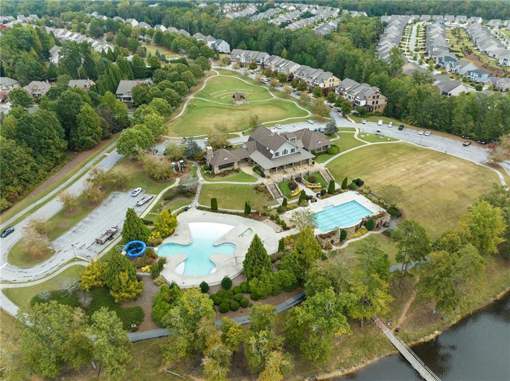 6667 Rivergreen Road Flowery Branch, GA 30542 - Photo 46 of 50 an aerial view of residential houses with outdoor space and swimming pool
