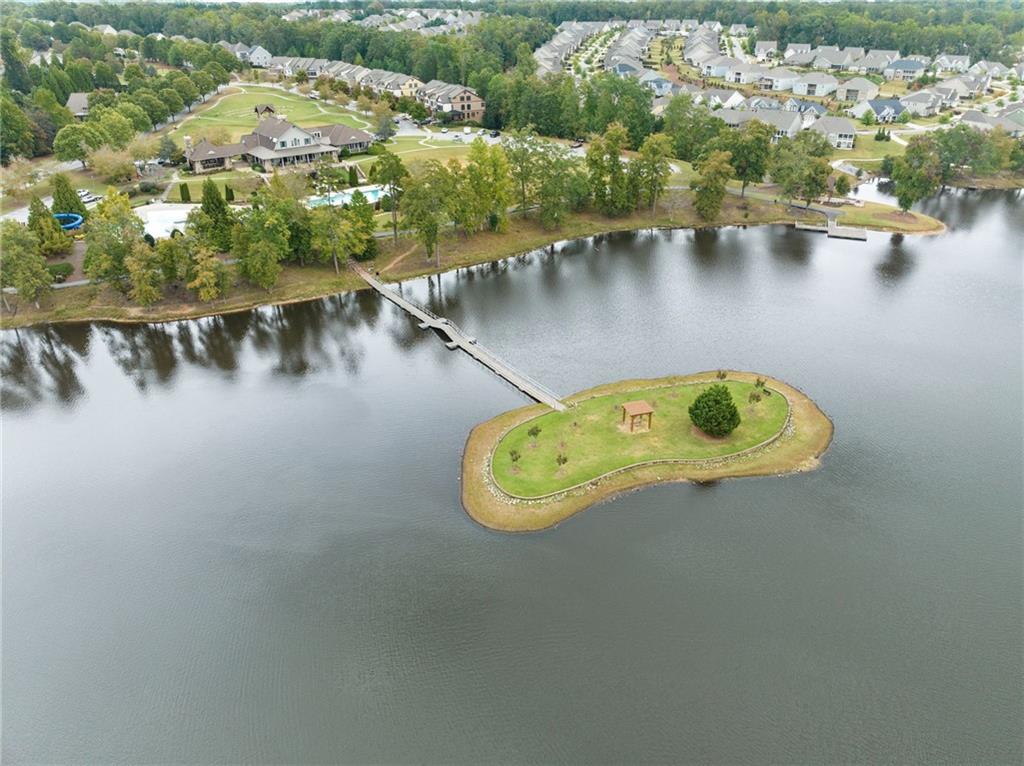 6667 Rivergreen Road Flowery Branch, GA 30542 - Photo 48 of 50 an aerial view of a house with outdoor space and lake view