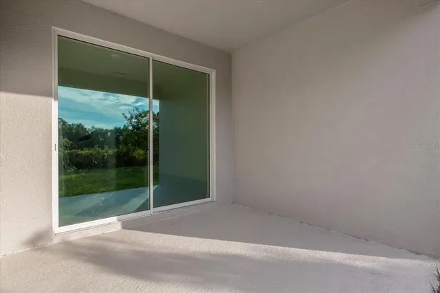 an aerial view of a house with swimming pool