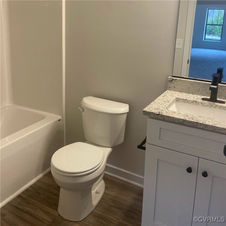 20193 Bennett Way Orange, VA 22960 - Photo 35 of 41 a bathroom with a granite countertop toilet and a sink