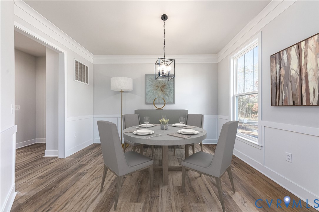 20193 Bennett Way Orange, VA 22960 - Photo 8 of 41 a view of a dining room with furniture window and wooden floor