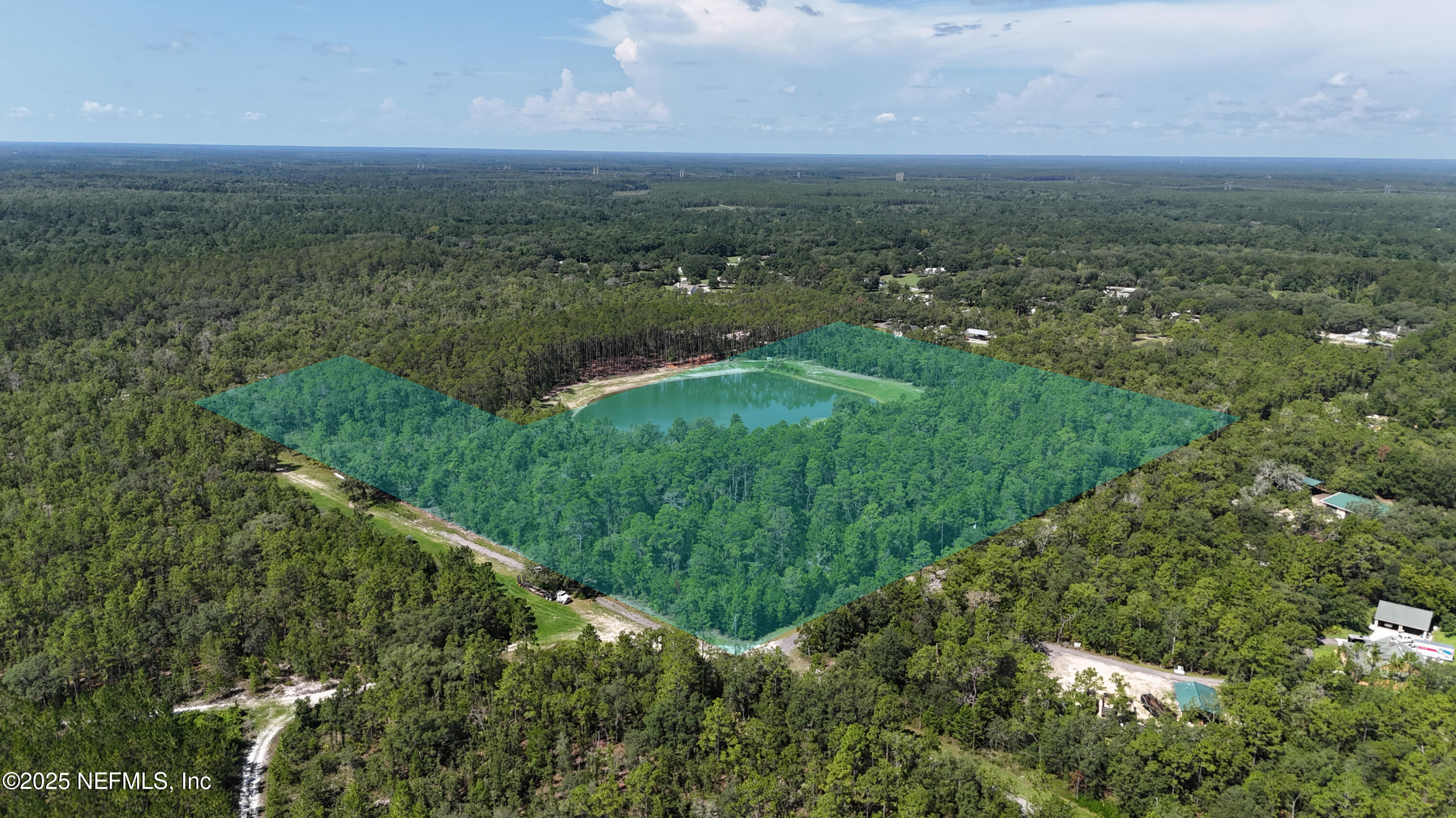 3212 Thunder Road Middleburg, FL 32068 - Photo 13 of 17 a view of a green field with lots of bushes