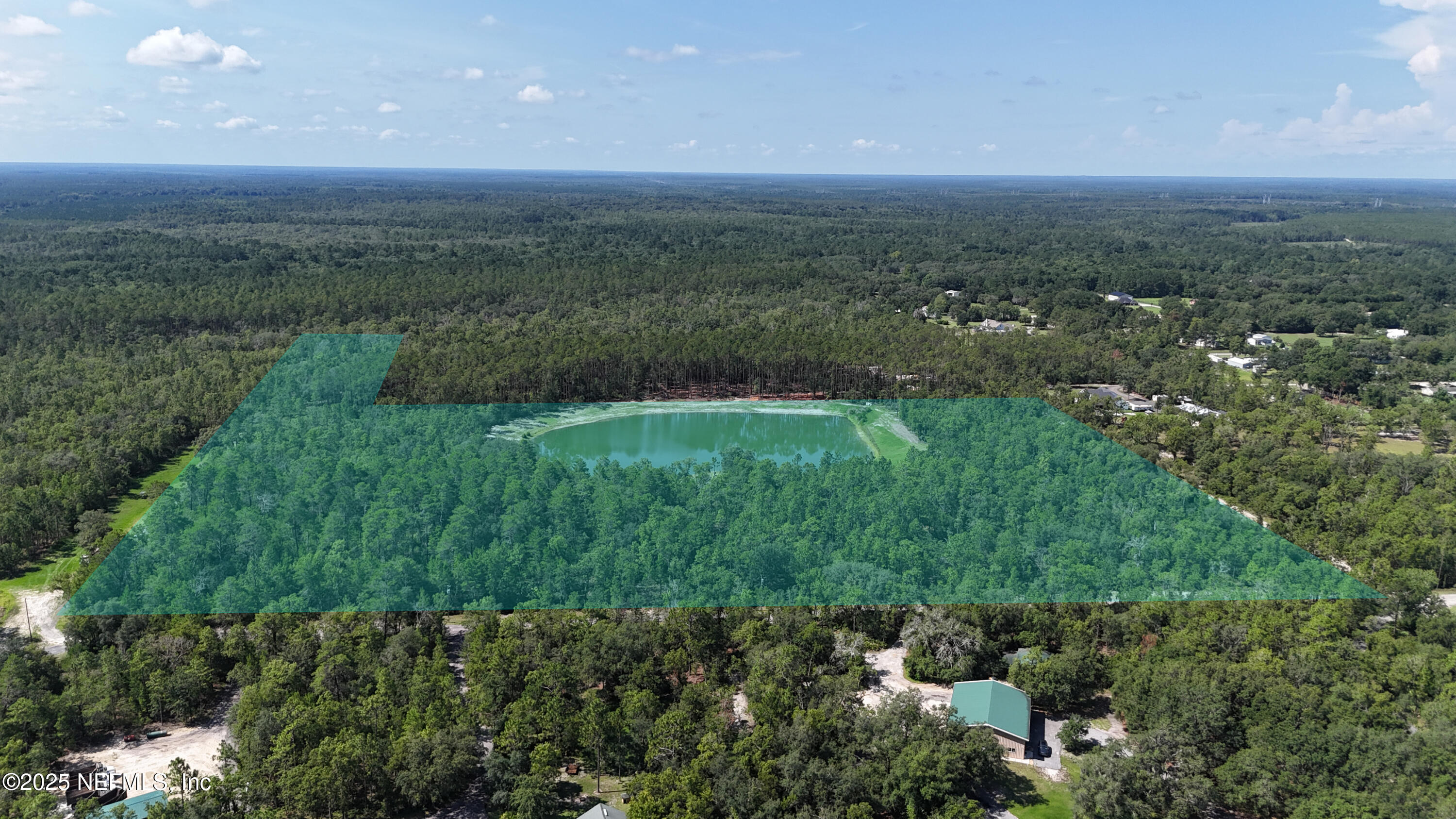 3212 Thunder Road Middleburg, FL 32068 - Photo 15 of 17 a view of a green yard with large trees
