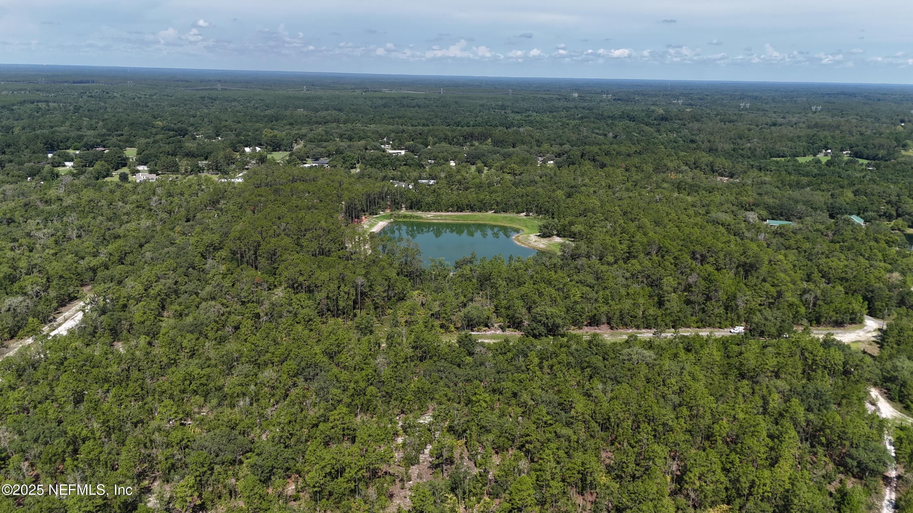 3212 Thunder Road Middleburg, FL 32068 - Photo 10 of 17 an aerial view of residential houses with outdoor space and trees