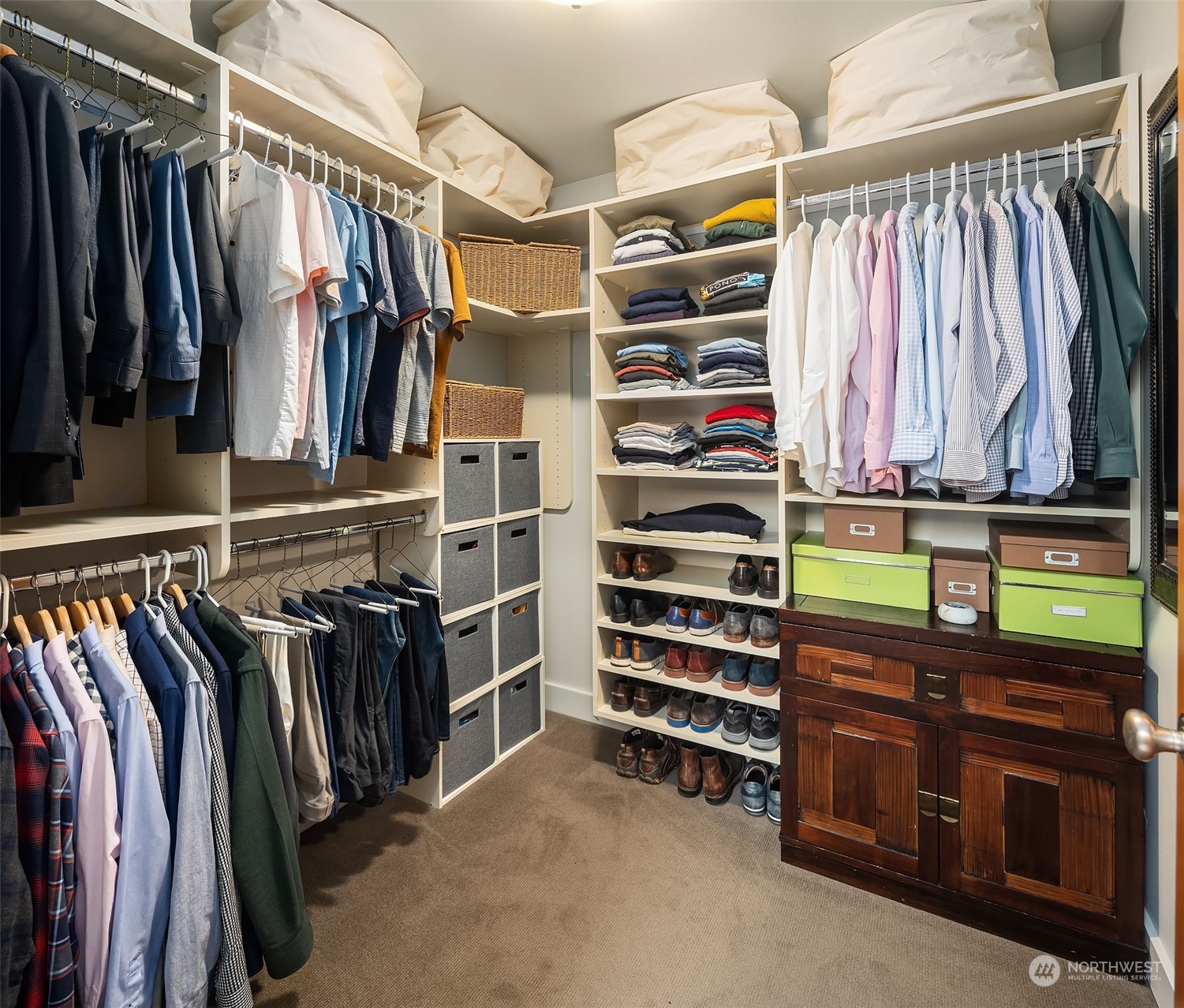 1605 East Pike Street, Unit 201 Seattle, WA 98122 - Photo 14 of 20 a view of walk in closet with clothes and shoes