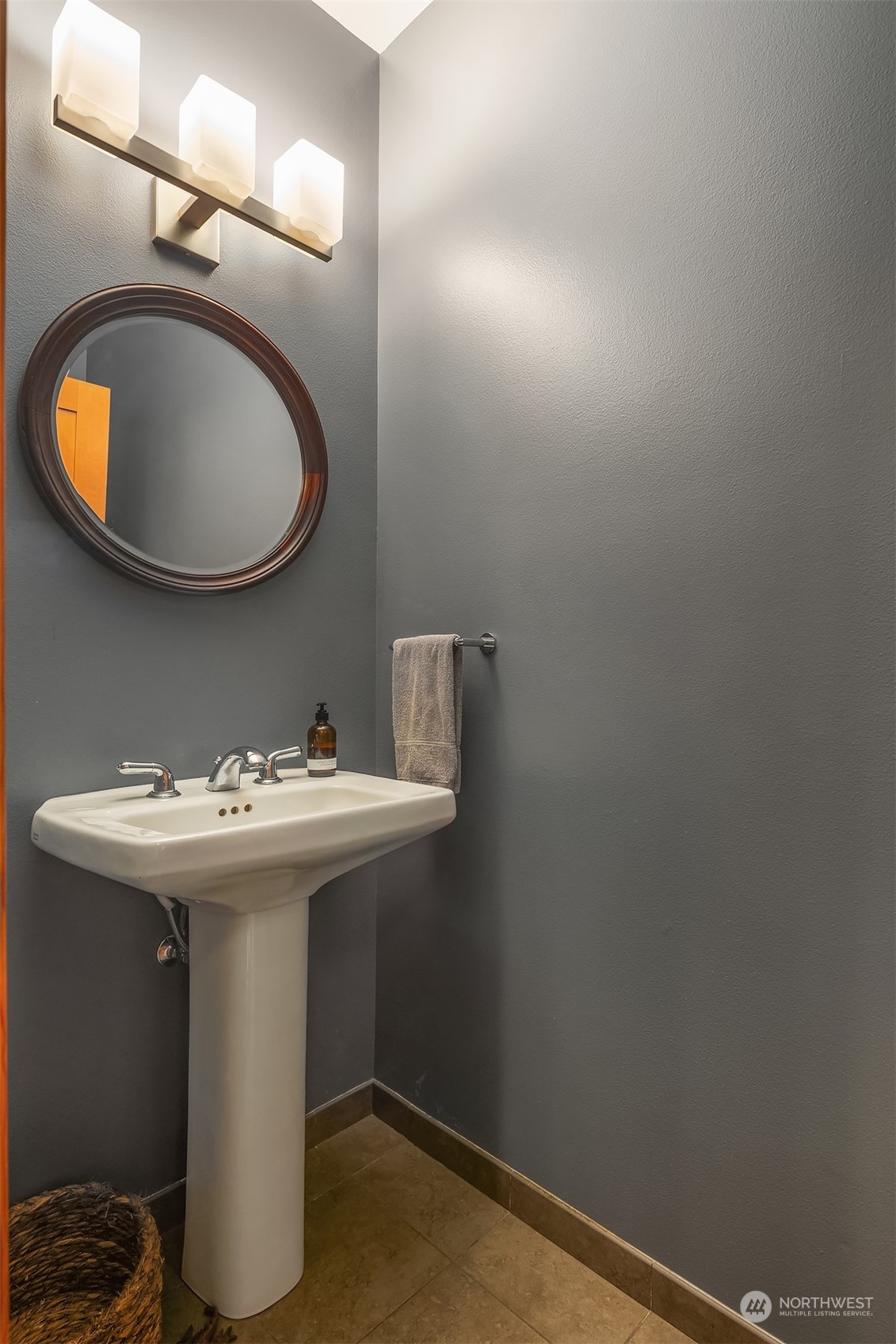 1605 East Pike Street, Unit 201 Seattle, WA 98122 - Photo 8 of 20 a bathroom with a sink and a mirror