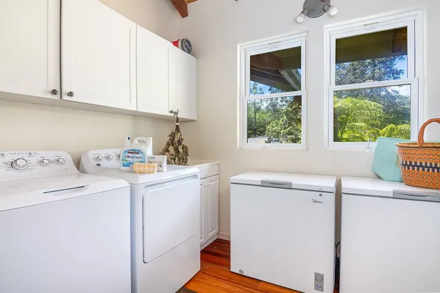 a utility room with dryer and washer