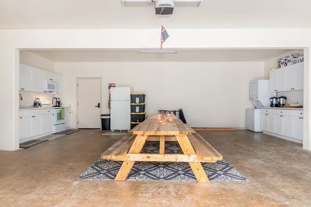 a living room with a patio and a rug