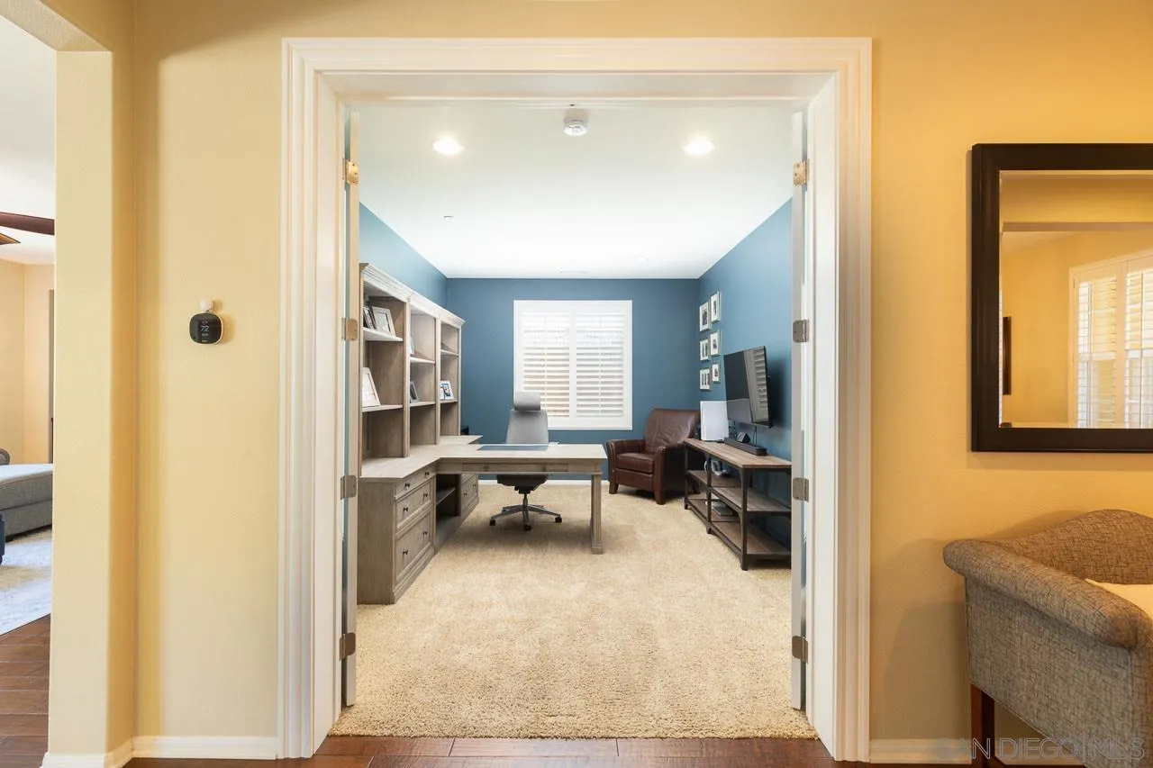 17662 Ralphs Ranch Road San Diego, CA 92127 - Photo 11 of 27 a view of living room with furniture and a window