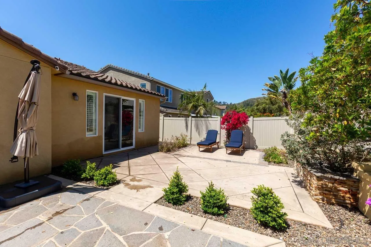 17662 Ralphs Ranch Road San Diego, CA 92127 - Photo 26 of 27 a front view of a house with a garage