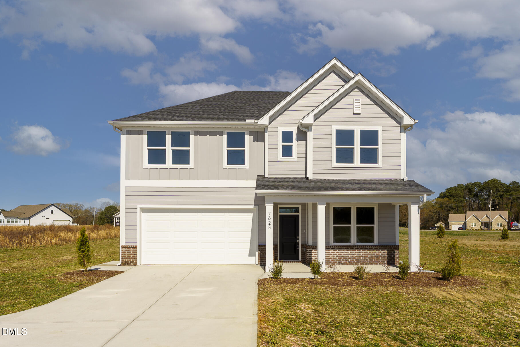 7628 New Sandy Hill Church Road Sims, NC 27880 - Photo 1 of 46 a front view of a house with a yard