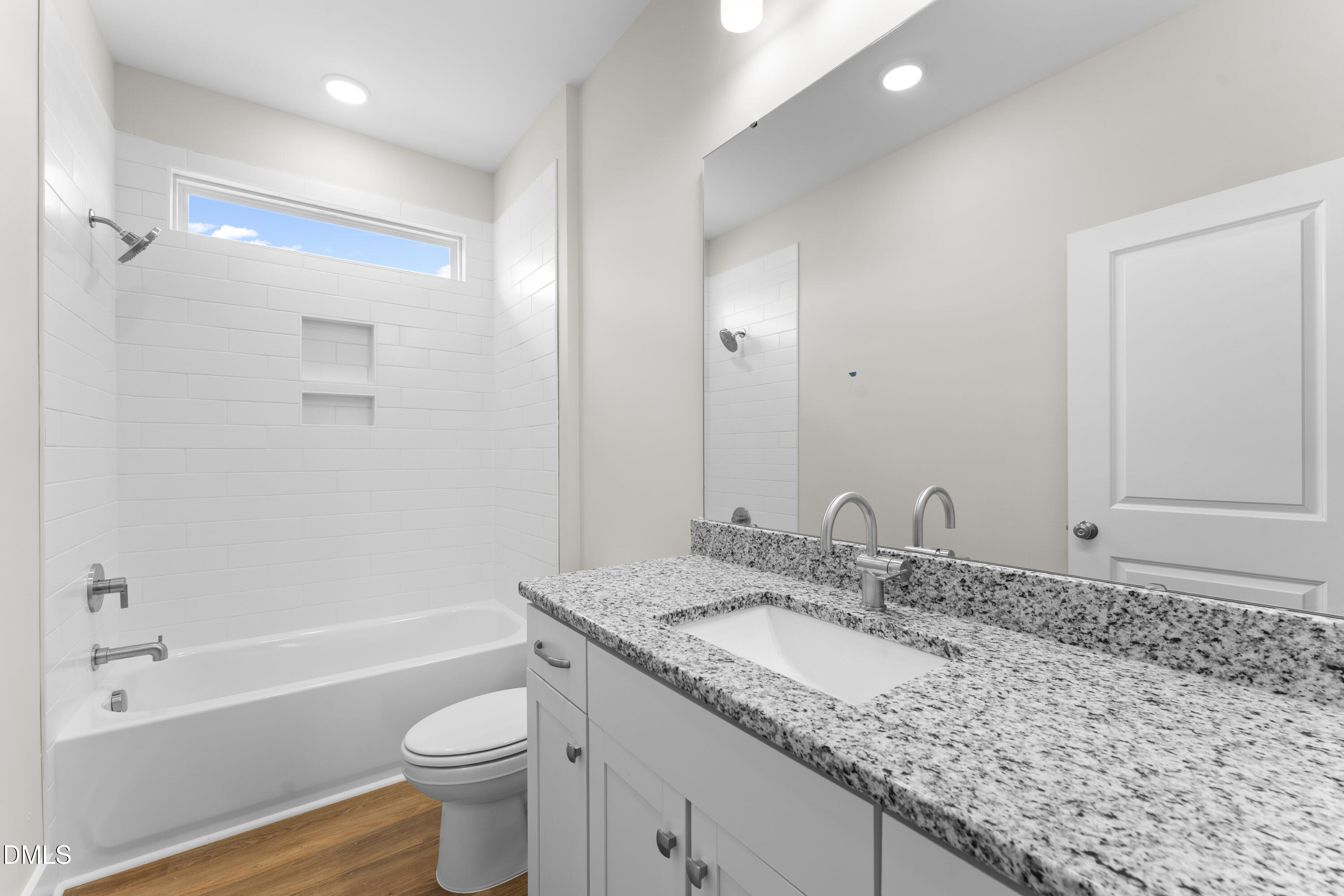 7628 New Sandy Hill Church Road Sims, NC 27880 - Photo 31 of 46 a bathroom with a granite countertop sink toilet and shower