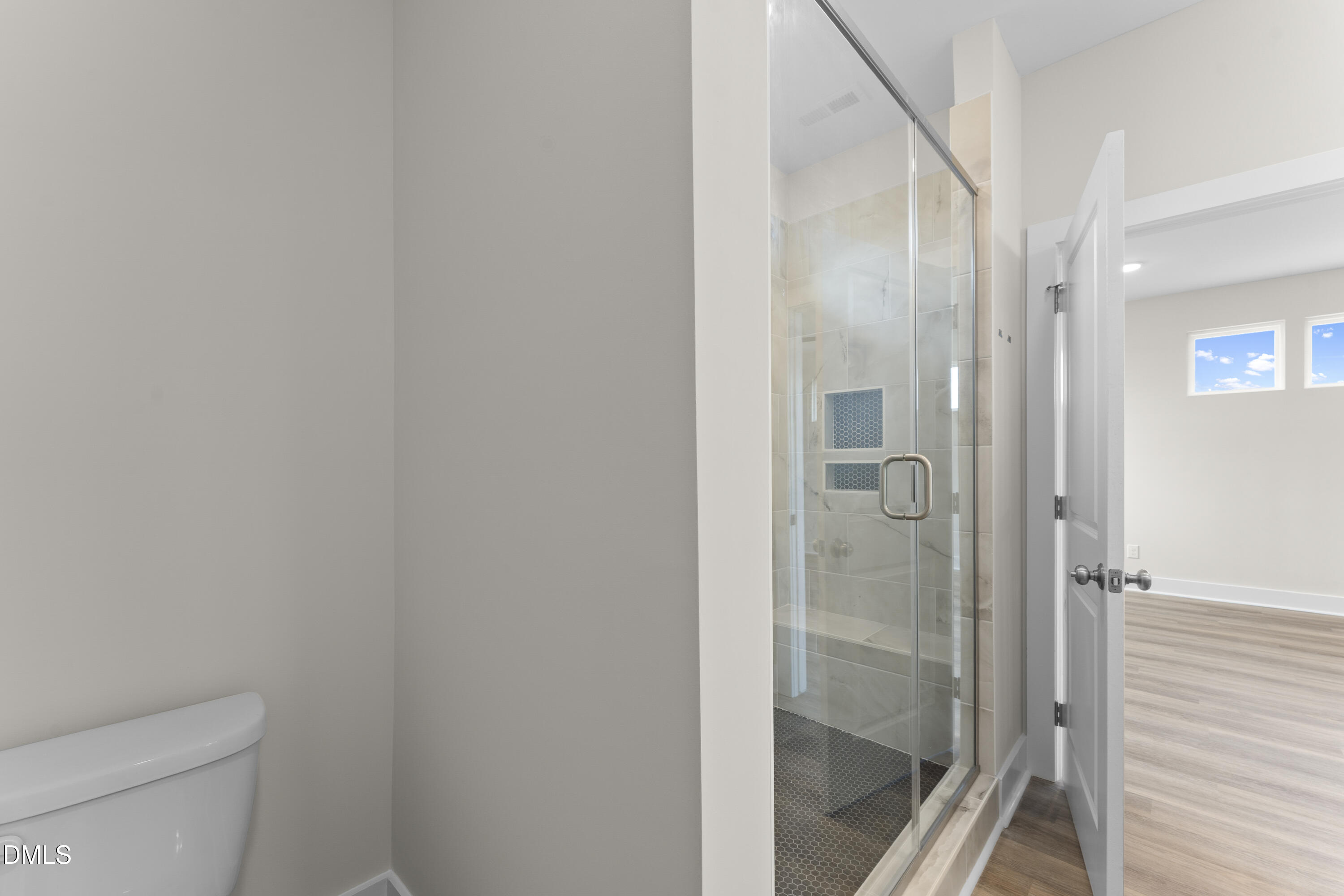 7628 New Sandy Hill Church Road Sims, NC 27880 - Photo 38 of 46 a bathroom with a shower and toilet