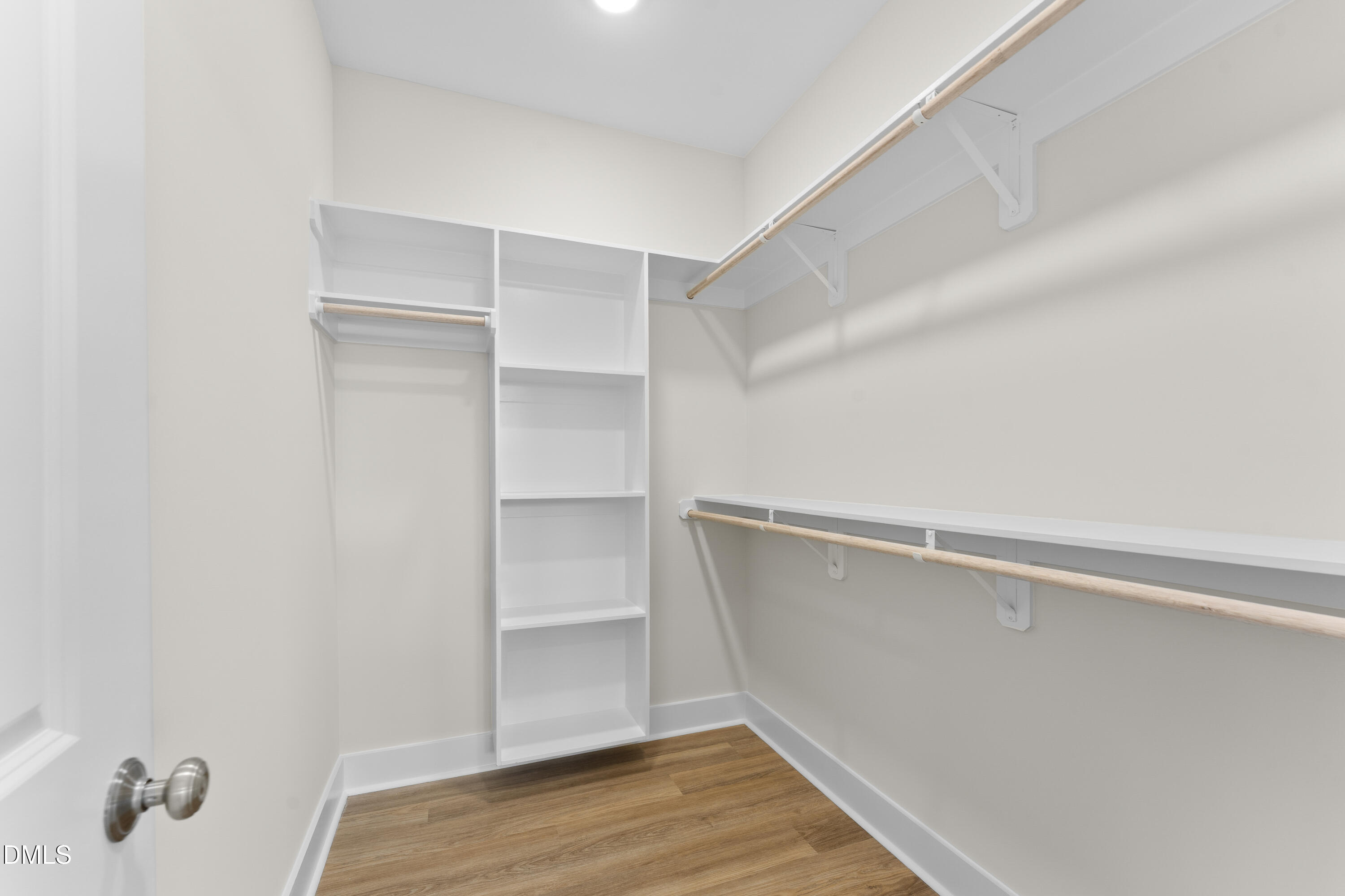 7628 New Sandy Hill Church Road Sims, NC 27880 - Photo 39 of 46 a view of walk in closet with empty racks
