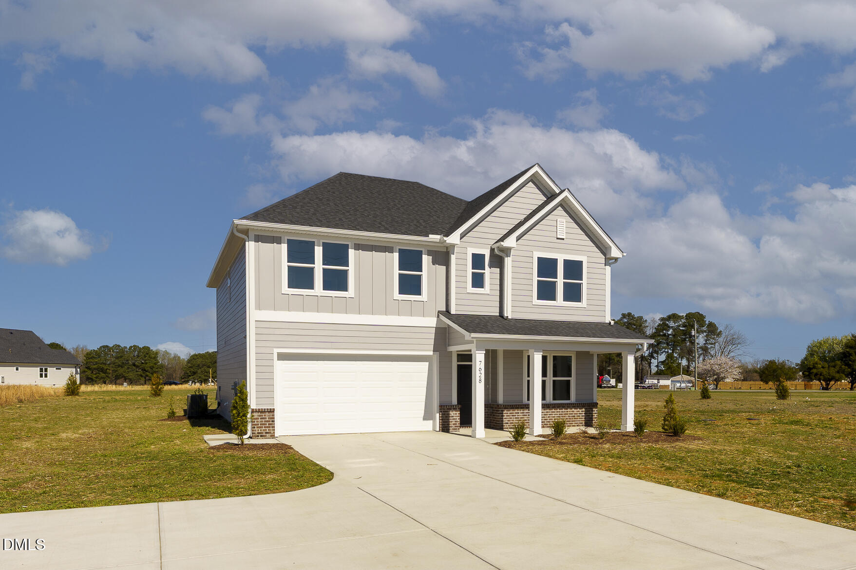 7628 New Sandy Hill Church Road Sims, NC 27880 - Photo 3 of 46 a front view of a house with a yard
