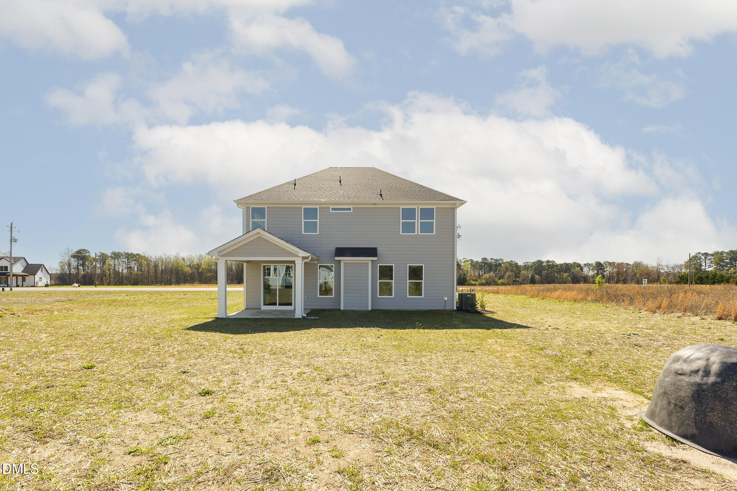 7628 New Sandy Hill Church Road Sims, NC 27880 - Photo 41 of 46 a front view of a house with a yard