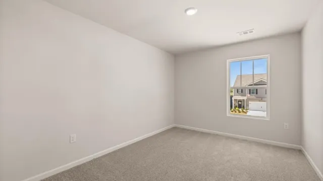 a view of a city with mountains in the background