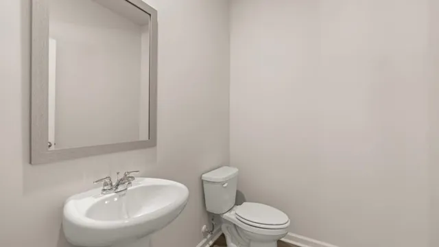 a bathroom with a sink and a toilet