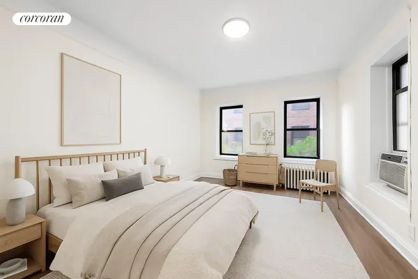a bedroom with a bed and a couch
