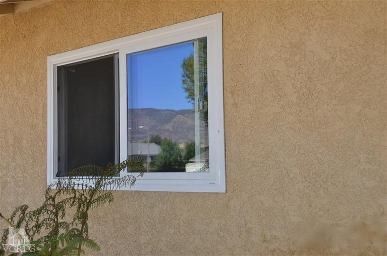 5776 Katherine Street Simi Valley, CA 93063 - Photo 10 of 11 a view of a bathroom with tub and window