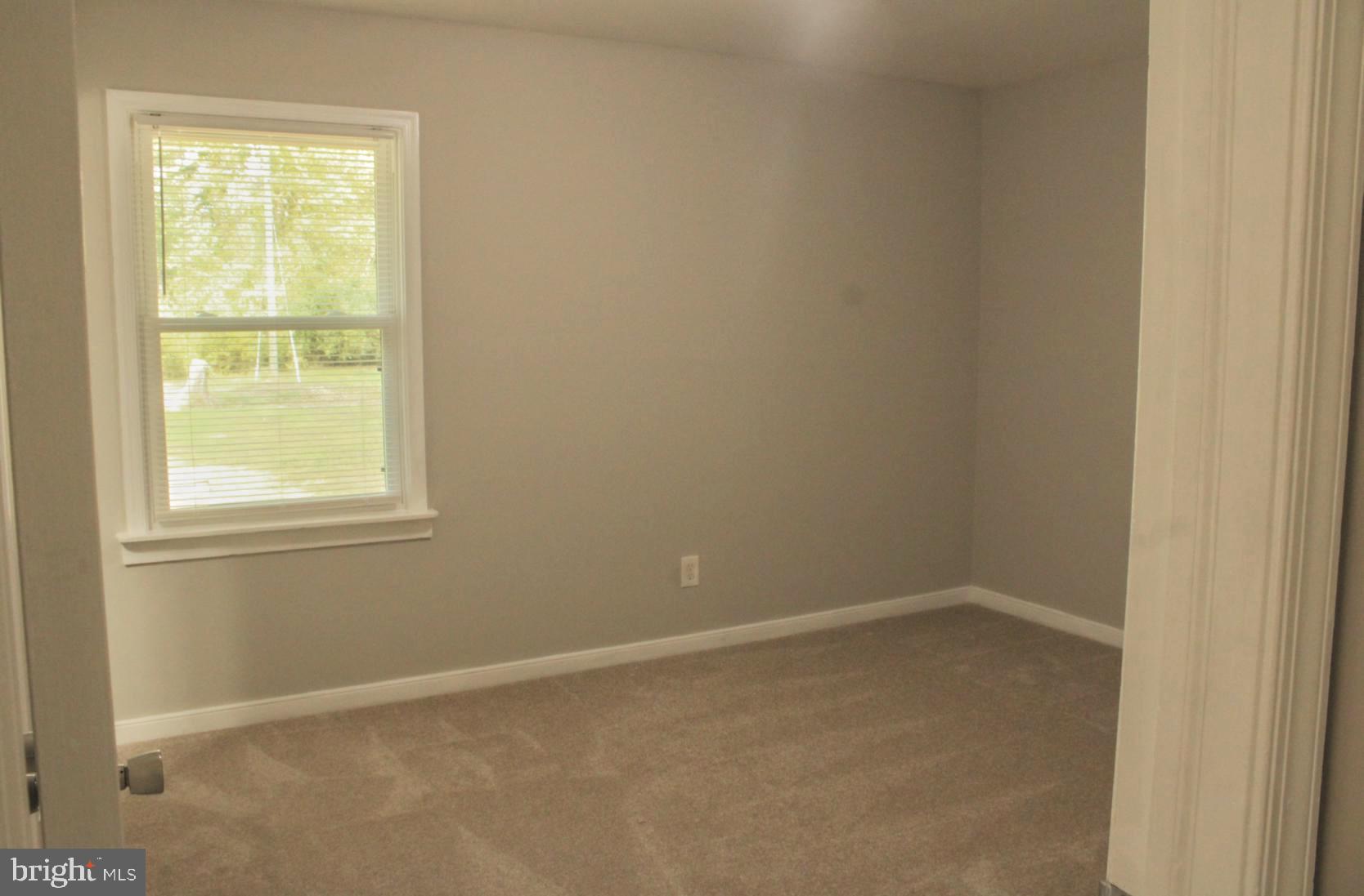 25073 Oxford Road Ruther Glen, VA 22546 - Photo 17 of 37 an empty room with a window