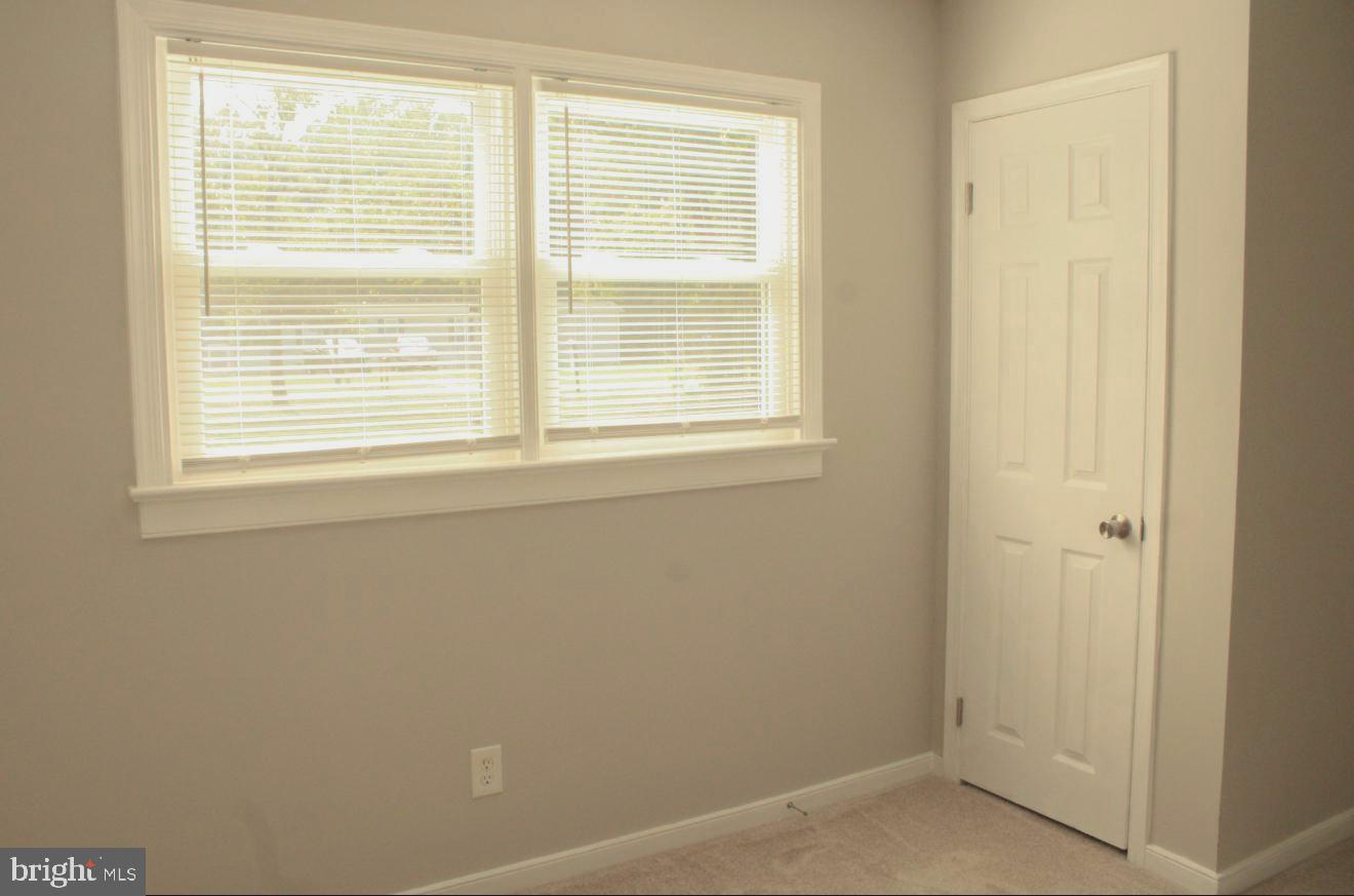 25073 Oxford Road Ruther Glen, VA 22546 - Photo 19 of 37 a view of an empty room with a window