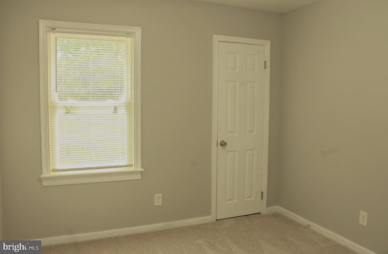 25073 Oxford Road Ruther Glen, VA 22546 - Photo 25 of 37 an empty room with windows