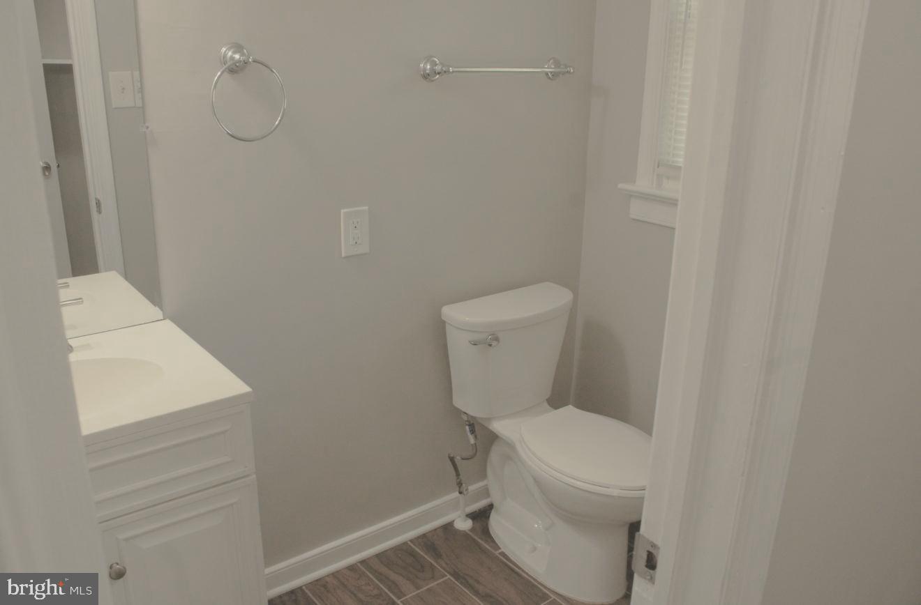 25073 Oxford Road Ruther Glen, VA 22546 - Photo 29 of 37 a white toilet sitting next to a shower