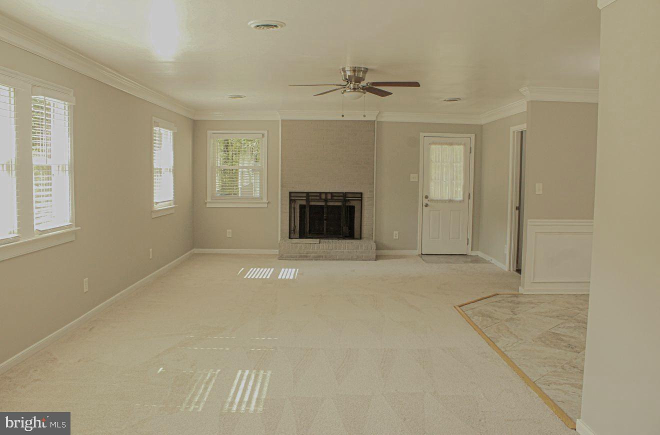 25073 Oxford Road Ruther Glen, VA 22546 - Photo 5 of 37 a view of a livingroom with a fireplace