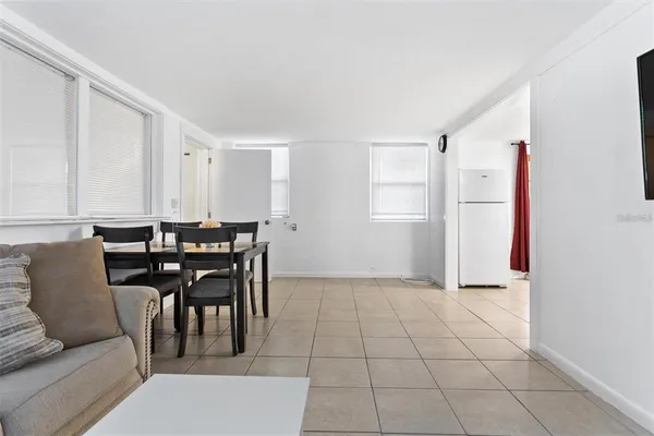 a view of a livingroom with furniture and window