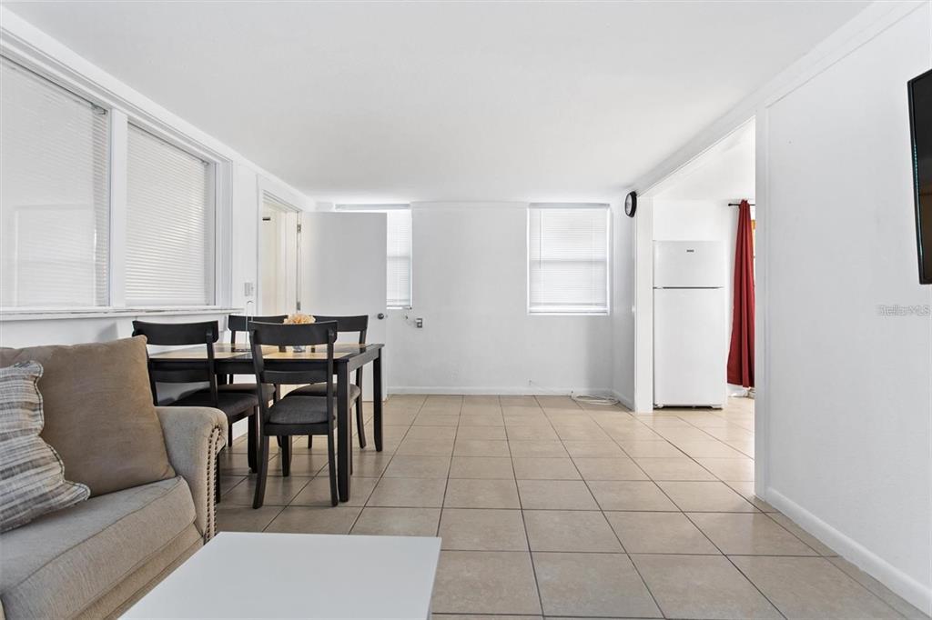 904 Lakeview Road, Unit B Clearwater, FL 33756 - Photo 15 of 19 a view of a livingroom with furniture and window