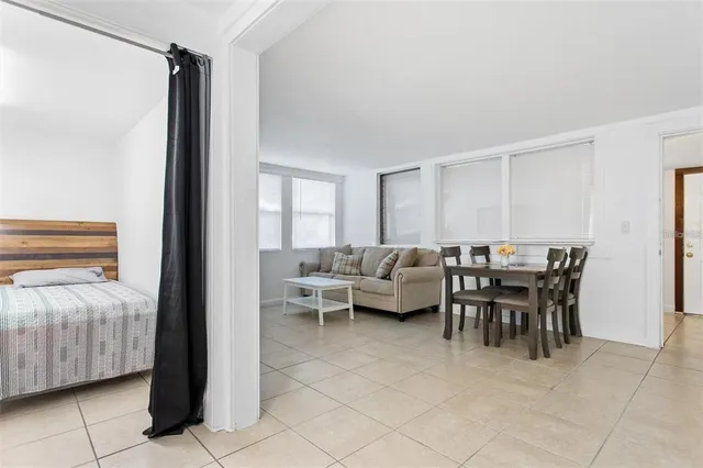 a living room with furniture and a window