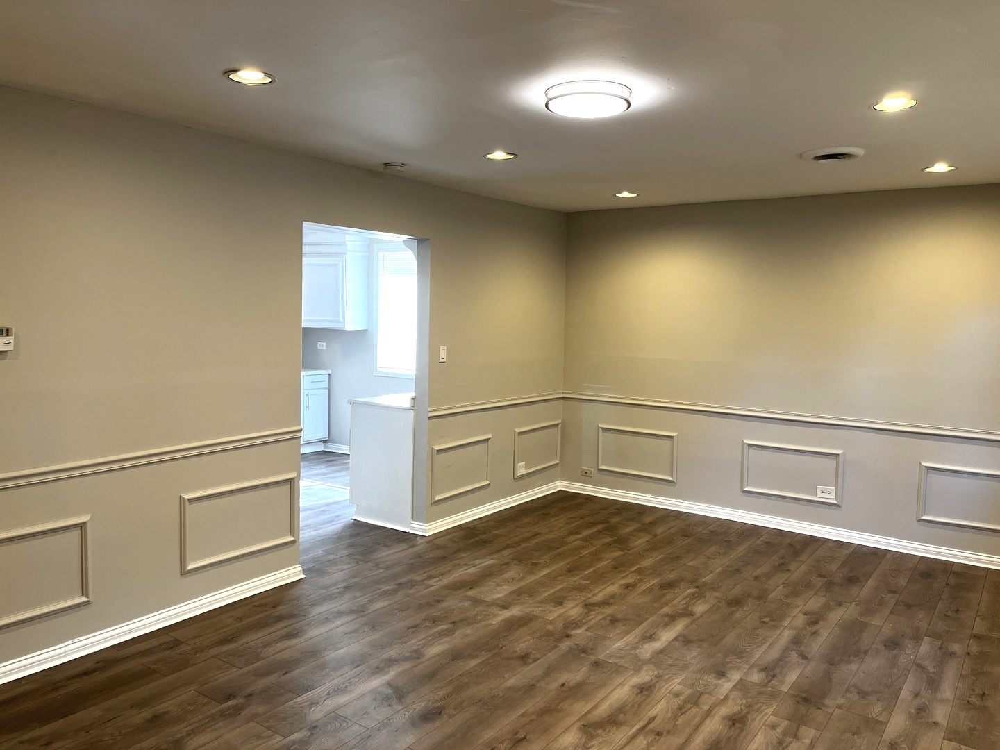 22 Apple Lane Park Forest, IL 60466 - Photo 2 of 13 a view of an empty room with wooden floor