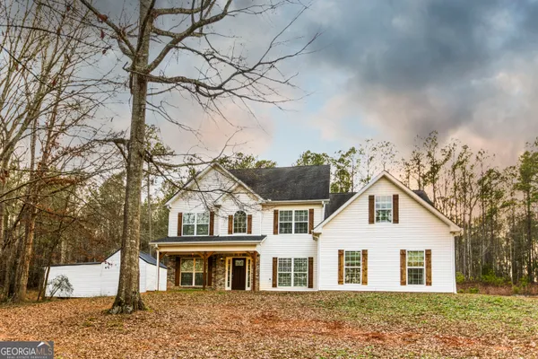 front view of house with a yard