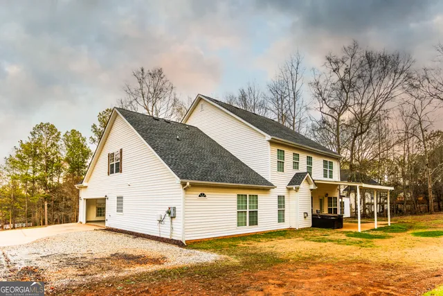 a backyard of a house with lots of green space