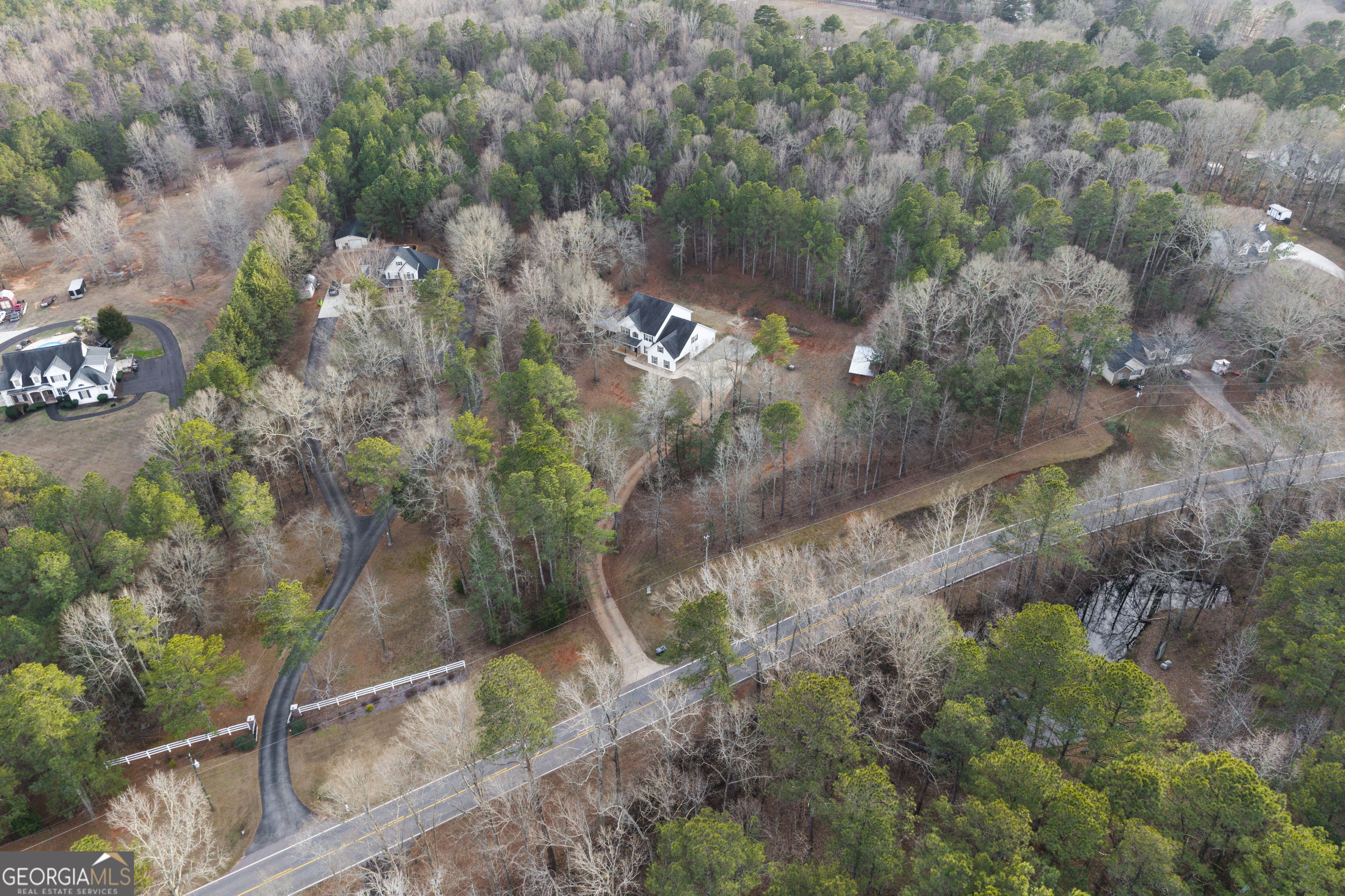 931 Bethany Road Covington, GA 30016 - Photo 14 of 83 an aerial view of house with yard and mountain view in back