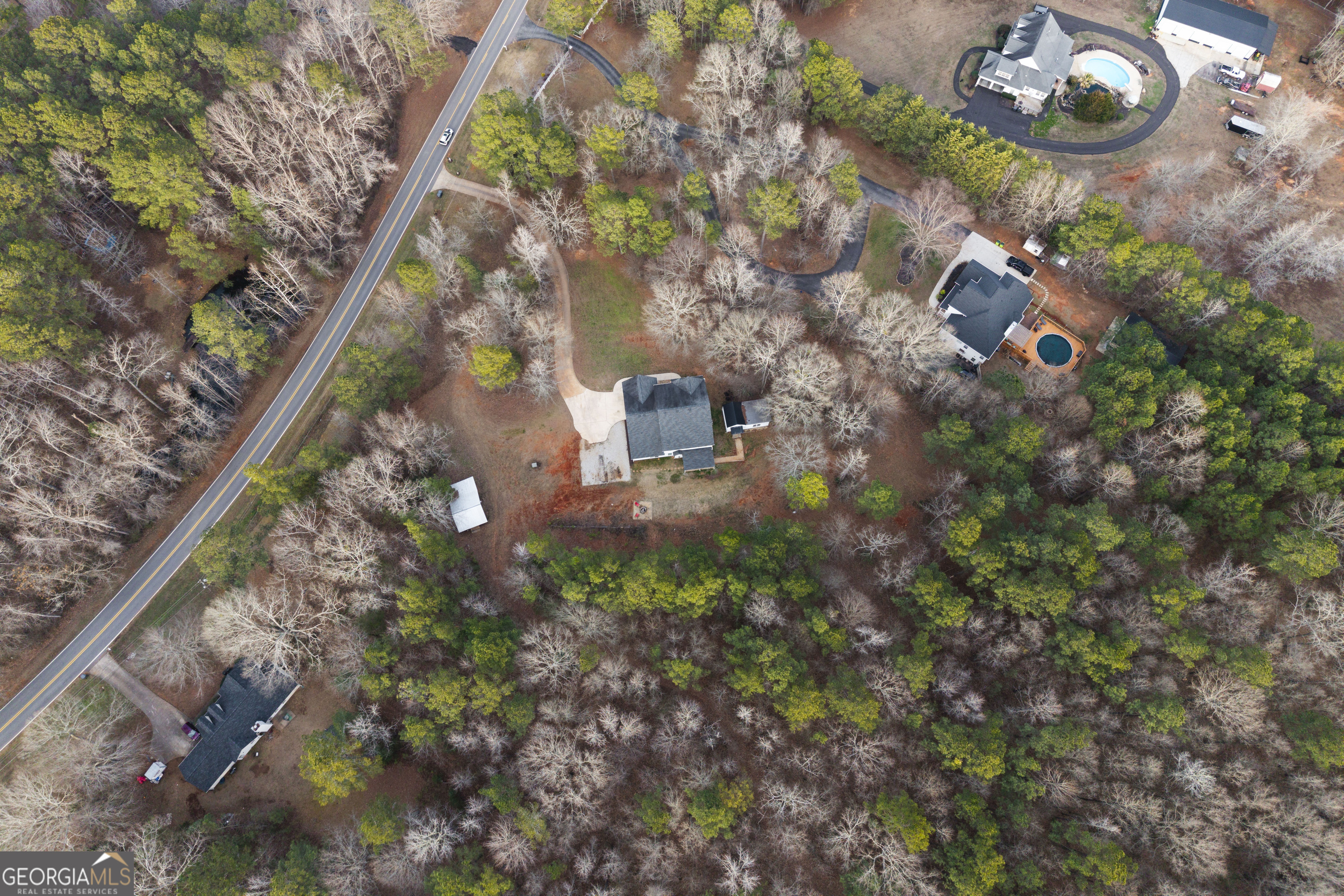 931 Bethany Road Covington, GA 30016 - Photo 17 of 83 a backyard of a house with lots of green space