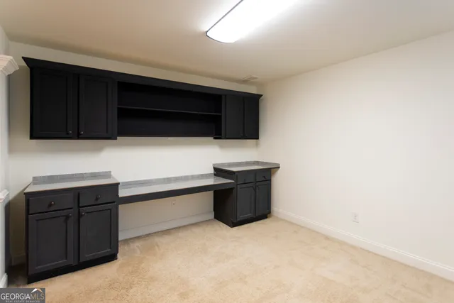 a view of a room with rack and wooden floor